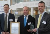 Ben Waterton (r) and Adam Axtell-Powell (l) of Lockton present Matt French with the President's Prize.